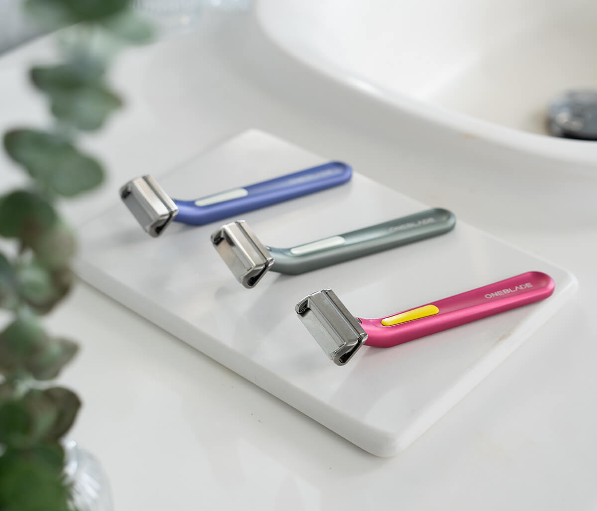 Three Dawn Women's Safety Razors displayed on bathroom counter