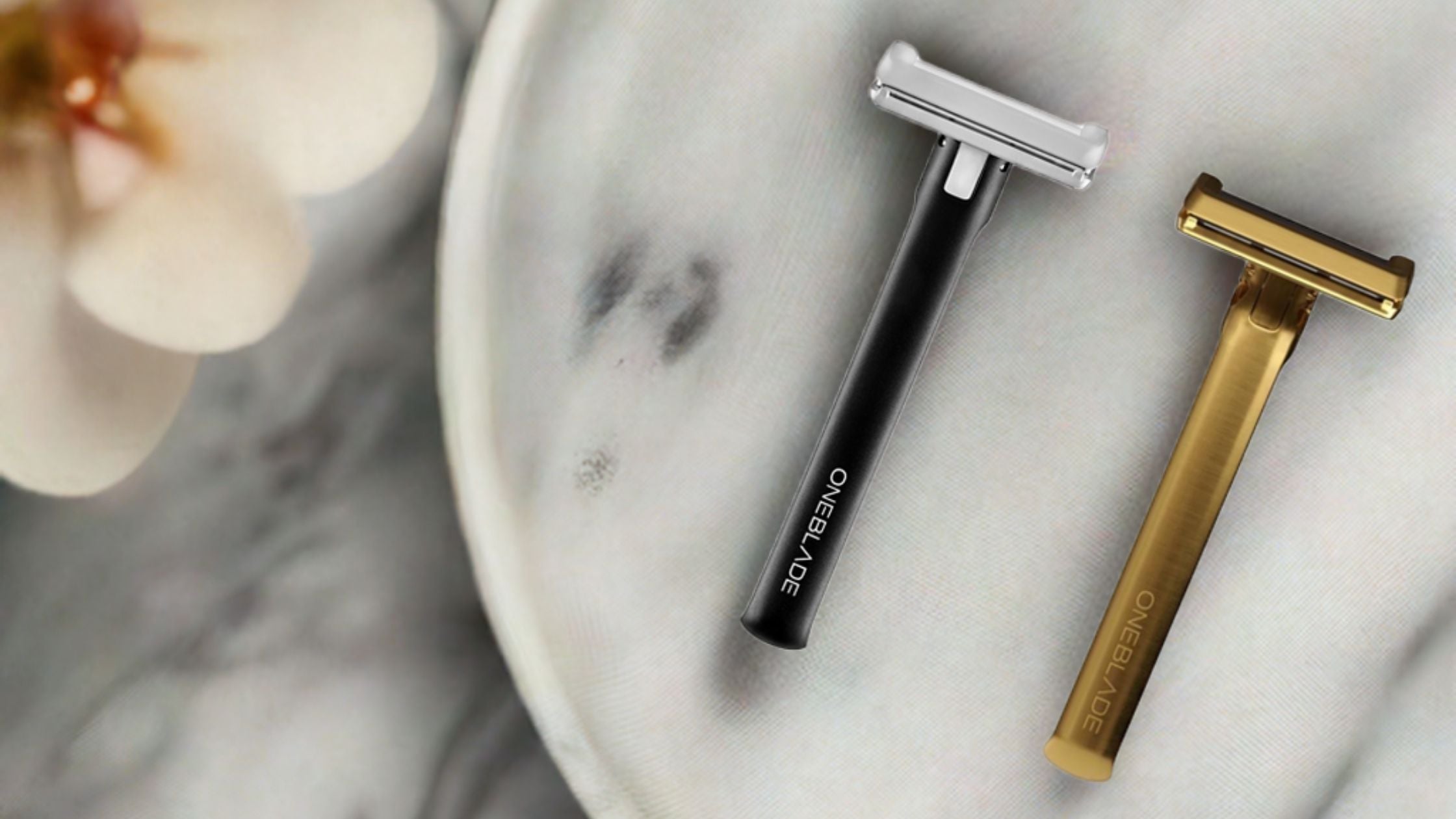 OneBlade Genesis and Element razors on bathroom counter – best safety razors for men