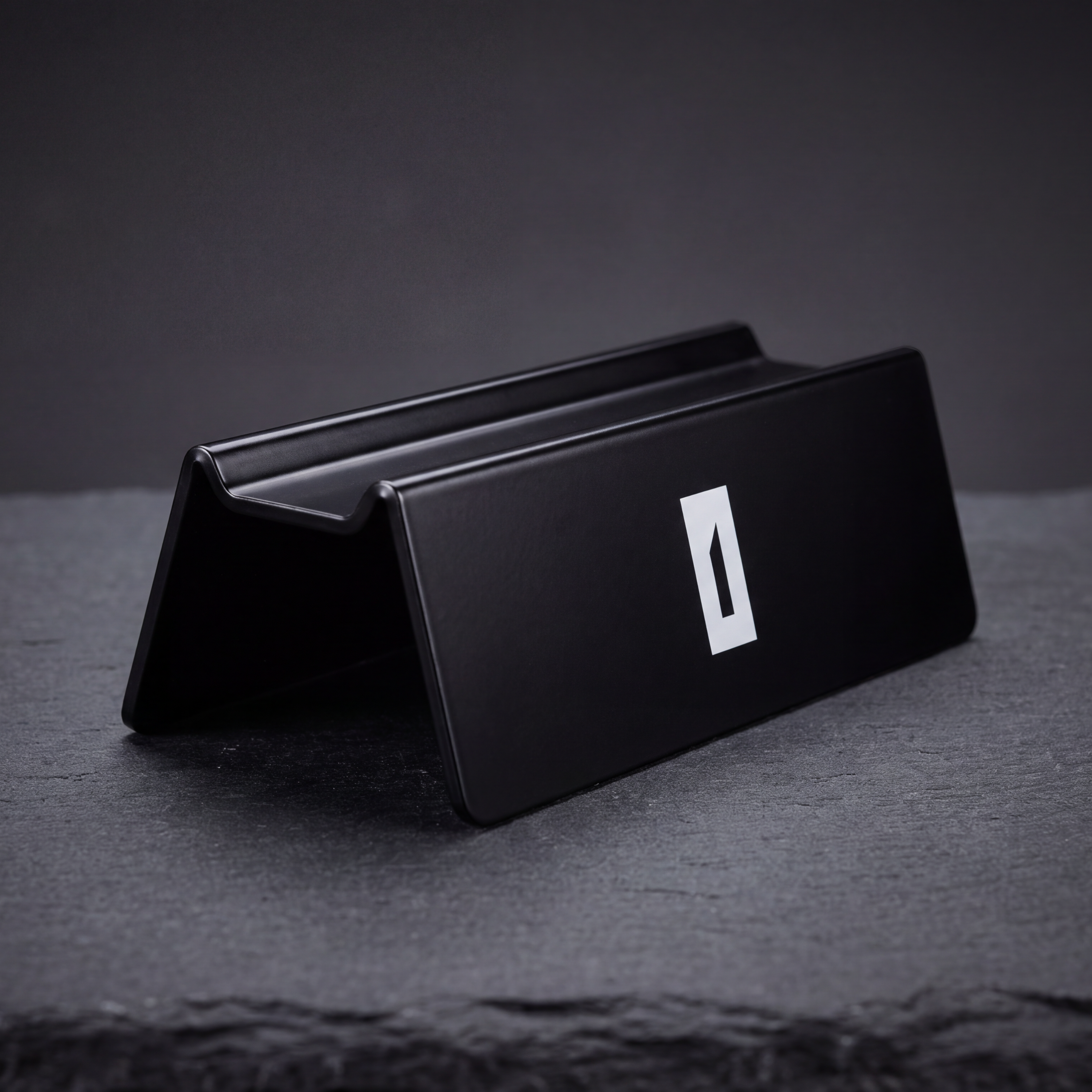 Generated_with_Kive.ai_-_Turn_this_into_a_clean_premium_product_shot_of_the_razor_stand._Keep_the_stand_design__proportions__edges__finish__and_logo_intact._Remove_dust__smudges__fing.png
