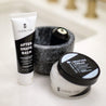 display of oneblade black tie shaving accessories kit on bathroom counter