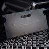 OneBlade Safety Razor Blade on metal texture